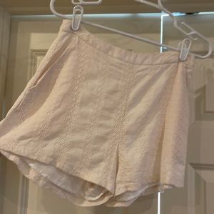 Cream colored zipper shorts